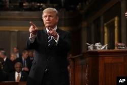 President Donald Trump reacts after addressing a joint session of Congress on Capitol Hill in Washington, Feb. 28, 2017.