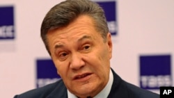 Ukraine's ousted president Viktor Yanukovych speaks at a news conference in Rostov-on-Don, Russia, Nov. 25, 2016. 