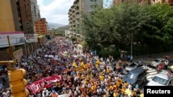 Opposition supporters demonstrate against Venezuela's President Nicolas Maduro's government in Caracas, Feb 12, 2014.