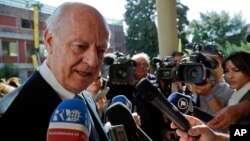 UN Special Envoy for Syria Staffan de Mistura talks with journalists as he arrives at a conference on the situation in Syria and Iraq held by Catholic charities operating in those regions, at the Vatican, Sept. 29, 2016. 