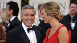 George Clooney and Stacy Keibler arrive at the 69th Annual Golden Globe Awards in Los Angeles