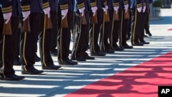 FILE - Kosovo's Security Force honor guard line up prior to the arrival of Albania's President Ilir Meta, during a welcome ceremony ahead of his meeting with Kosovo President Hashim Thaci on Oct. 11, 2017, in Kosovo capital Pristina. 