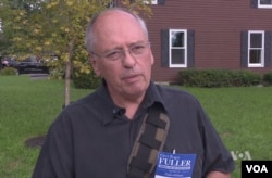 Democrat Roger Fuller, a first-time candidate for Maine’s House of Representatives, campaigns door to door to meet voters.