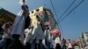 စစ်အာဏာရှင်ဆန့်ကျင်ဆန္ဒပြပွဲအတွင်း ပါဝင်ခဲ့တဲ့ ကျန်းမာရေးဝန်ထမ်းများ။ (ဖေဖော်ဝါရီ ၂၅၊ ၂၀၂၁)