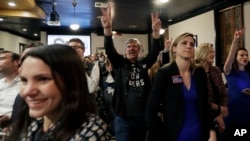 Supporters of U.S. Senate hopeful Beto O'Rourke cheer during a Democratic watch party following the Texas primary election, in Austin, Texas, March 6, 2018.