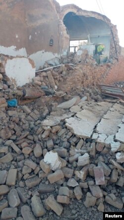 Debris caused by an earthquake is seen in Ravar, Kerman province, Iran, in this picture obtained by Reuters from social media, Dec. 1, 2017. (Hamid Sadeghi/via Reuters)