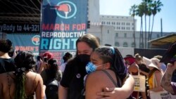 FILE - Demonstrators rally to demand continued access to abortion during the March for Reproductive Justice, Oct. 2, 2021, in downtown Los Angeles.