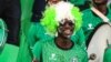 A Nigeria supporter cheers prior to the Group D Africa Cup of Nations (CAN) 2021 football match between Nigeria and Sudan at Stade Roumde Adjia in Garoua, Jan. 15, 2022.