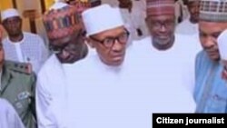 Shugaba Muhammad Buhari da wasu hadimansa