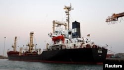 A ship carrying 5,500 metric tons of flour is docked at the Red Sea port of Hodeidah, Yemen, Nov. 26, 2017.