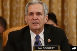 FILE - Rep. Lloyd Doggett, D-Texas, speaks during a House Ways and Means Committee hearing on Capitol Hill in Washington, June 4, 2013.