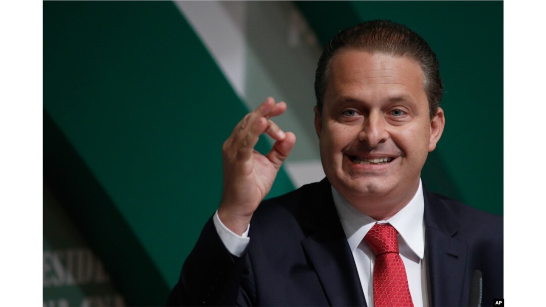 In this Aug. 6, 2014 photo, Brazilian Socialist Party (PSB) presidential candidate Eduardo Campos campaigns in Brasilia, Brazil.
