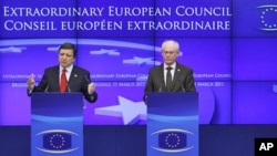 European Commission President Jose Manuel Barroso, left, and European Council President Herman Van Rompuy participate in a media conference at an EU Summit in Brussels, March 12, 2011