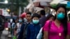 People in Yangon seen here wearing masks to protect from swine flu virus. Jul. 27th, 2017.