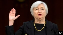 Janet Yellen, of California, President Barack Obama's nominee to become Federal Reserve Board chair, is sworn in on Capitol Hill in Washington, Nov. 14, 2013.