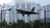 FILE - A U.S. Air Force F-22 Raptor lands at Gwangju Air Base in the southwestern city of Gwangju, South Korea, May 16, 2018. A next-generation fighter jet that would replace the F-22 is facing budget challenges.
