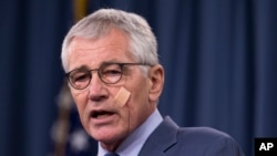 Menhan AS Chuck Hagel dalam konferensi pers di Pentagon (14/11).