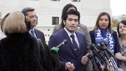 Jirayuth Latthivongskorn, a DACA recipient, speaks to the press after the Supreme Court's hearing