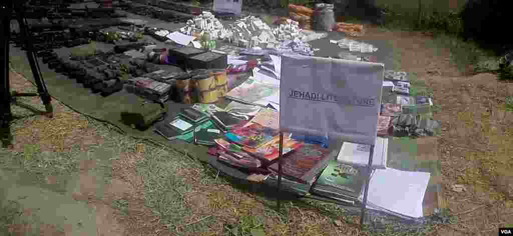 Arms and pro-Jihad literature seized from militants in Miranshah, North Waziristan, Pakistan. (Ayaz Gul/VOA)