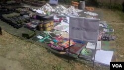 FILE - Arms and pro-Jihad literature seized from militants in Miranshah, North Waziristan, Pakistan. (Ayaz Gul/VOA)