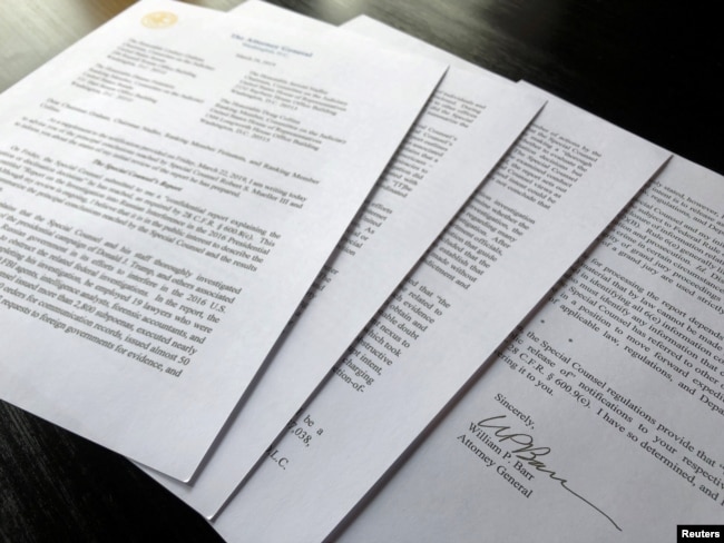 U.S. Attorney General William Barr's signature is seen on a four-page letter to congressional leaders on the conclusions of Special Counsel Robert Mueller's report on Russian 2016 election meddling, March 24, 2019.