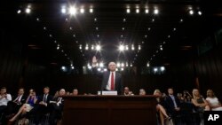 FILE - Attorney General Jeff Sessions is sworn-in on Capitol Hill in Washington, June 13, 2017, prior to testifying before a Senate Intelligence Committee hearing.