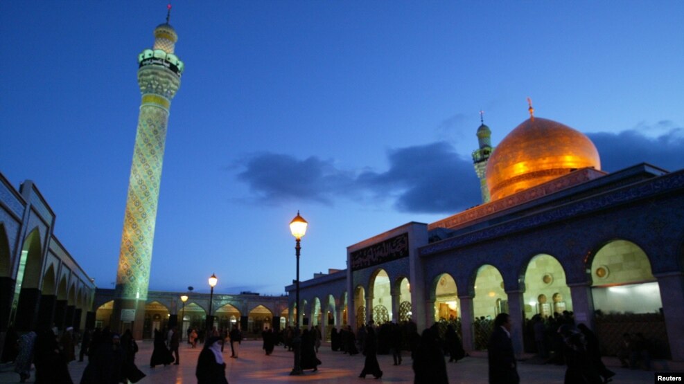 FILE - Shi'ite Muslims mostly from Iraq flock to the shrine of Sayyida Zeinab in Syria, March 25, 2003. Shi'ite Muslims frequent the shrine they believe is the tomb of the Prophet Mohammed's granddaughter. 