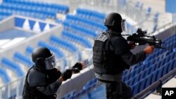 Members of Research and Intervention Brigades (BRI) attend a training exercise in case of terrorist attack at the G6 Interior Ministers' meeting at the Groupama stadium in Decines, near Lyon, central France, Oct. 9, 2018. 