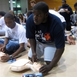 More than 1,000 students at Emory University in Atlanta, Georgia, including freshmen Brian Oliver, left, and Andre Lumpkin, learned basic CPR at a mass training event in 2009