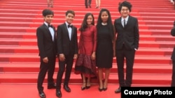 From left to right: Nov Cheanick, Chhem Madeza, Nuon Sobon, Tith Kanitha, Davy Chou posed for a photo on the official red carpet the day of the official screening of the film, Friday 13, May 2016.
Actors' clothes were designed by Colorblind and actress' dress by Kool as U. (Photo: Barbara Lombeek)