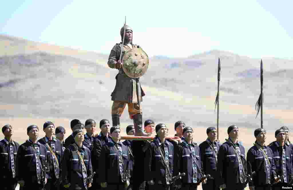 Kazakh servicemen perform during a ceremony opening the International Army Games at the 40th military base Otar in Zhambyl Region, Kazakhstan.