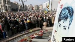 People take part in a rally in central Kyiv, Ukraine, demanding liberation of Ukrainian army pilot Nadezhda Savchenko by Russia, March 6, 2016.