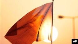 Protesters wave national flags and chant anti-government slogans during an all-women rally against alleged police brutality toward women Thursday, Sept. 29, 2011, in Miqsha, Bahrain.