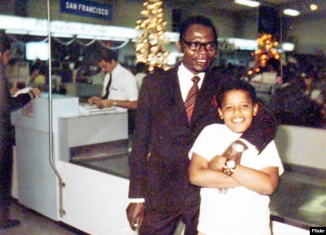 Young Barack Obama with his father