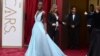 Hollywood Arrives for Oscars in Gowns and Shorts 
