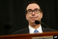 FILE - Treasury Secretary Steven Mnuchin testifies on Capitol Hill in Washington, May 24, 2017, before a House Ways and Means hearing on the Treasury Department's fiscal 2018 budget proposals.