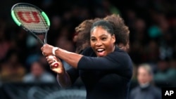 Serena Williams of the United States returns to Zhang Shuai of China during the semi-final round of the Tie Break Tens tournament at Madison Square Garden, Monday, March 5, 2018 in New York.