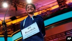Karthik Nemmani, 14, from McKinney, Texas, smiles as he wins the Scripps National Spelling Bee in Oxon Hill, Md., May 31, 2018. 