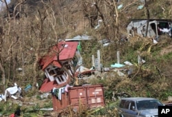 Homes lay scattered after the passing of Hurricane Maria in Roseau, the capital of the island of Dominica, Sept. 23, 2017.