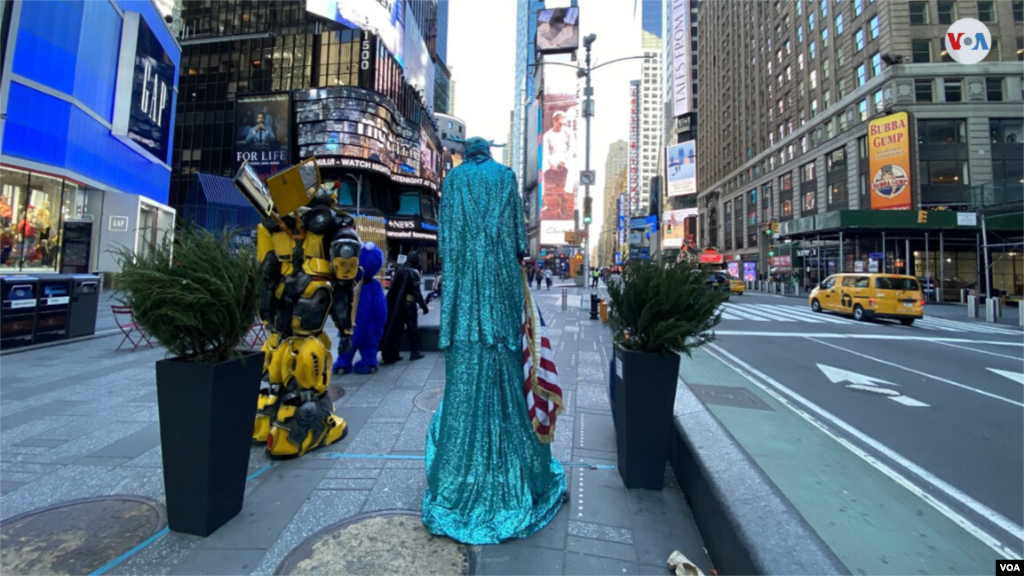 Times Square in New York with just a few people around due to the threat of coronavirus. (Photo: Ronen Suarc)