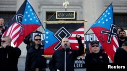 Commander Jeff Schoep of the National Socialist Movement, one of the largest white nationalist type groups in the country, speaks during a rally at the state capital in Little Rock, Arkansas, Nov. 10, 2018. 