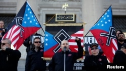 Commander Jeff Schoep of the National Socialist Movement, one of the largest white nationalist type groups in the country, speaks during a rally at the state capital in Little Rock, Arkansas, Nov. 10, 2018.