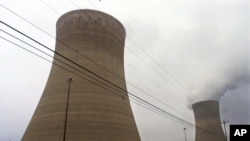 FILE - Cooling towers are seen at the Beaver Valley Power Station in Shippingport, Pennsylvania, Dec. 11, 2000.