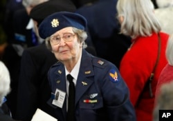 FILE - Wearing her WASP uniform from World War II, Eleanor Brown of Victoria, Texas, attends a Congressional Gold Medal ceremony on Capitol Hill in Washington, honoring the Women Airforce Service Pilots (WASP), March 10, 2010.