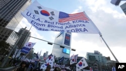 지난 23일 한국 서울에서 문재인 한국 대통령의 대북정책에 항의하는 시위가 열렸다. 