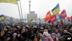 Opposition supporters take part in a rally in Kyiv's Independence Square in Ukraine, Feb. 9, 2014.