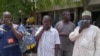 Traders who speak to Blueprint use scented handkerchief to cover their noses, Maiduguri, Nigeria, June 4, 2012. VOA / Kareem Ogori