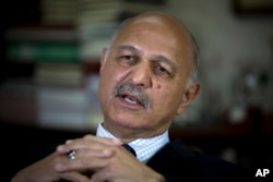 FILE - Mushahid Hussain, chairman of Pakistan's Senate Foreign Affairs Committee, is interviewed in Islamabad, Pakistan, Nov. 30, 2018.