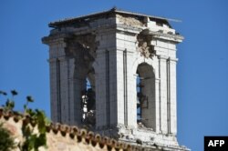A picture shows a damaged campanile after a 6.6 magnitude earthquake in Norcia, Italy, Oct. 30, 2016.