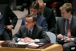 Italian Ambassador Sebastiano Cardi speaks during a Security Council meeting, Feb. 18, 2015, at United Nations headquarters.